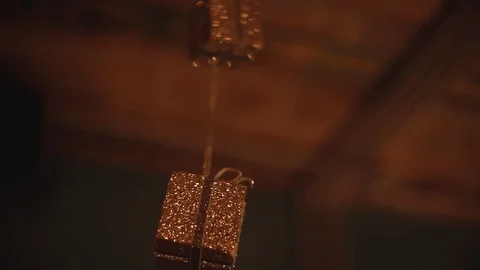 2. christmas presents hanging at a bar Stock Footage 101347083