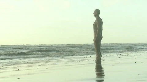 2 clips of Anthony Gormley's Another Place Stock-Footage 65993