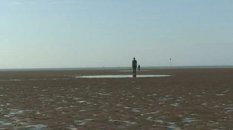 2 clips of Anthony Gormley's Another Place Video stock 66102