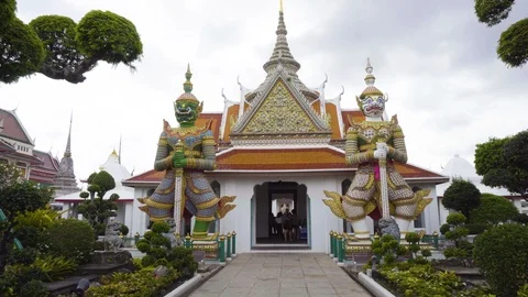 2 Clips - Large Buddhist Statues at Gate to Ordination Hall of Wat Arun Stock Footage 101459433