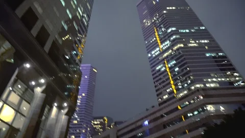 2 Clips - Looking Up Modern Skyscrapers At Night Stock Footage 91866093