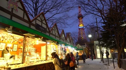 2 Clips - Sappro TV Tower and Christmas Market At Night With Snow - Sapporo Stock Footage 100872373