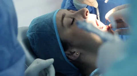 2 close ups - Dentist equipment and Patient face Stock Footage 41458150