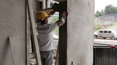 2 Construction Workers Plastering Walls or Wall Flattening - 4K Stock Footage 51256811