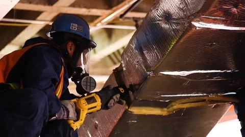 2 construction workers wearing construction hat and vest Stock Footage 87346529