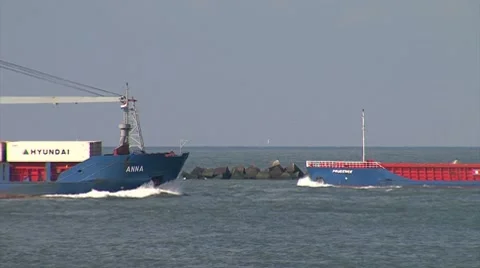 2 container ships passing Stock Footage 8548058