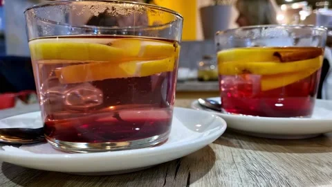 2 cups of fruit tea on a table. Stock Footage 229487562