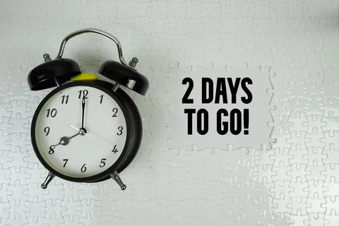 2 Days To Go! with alarm clock on white background Stock Photos