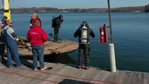 2 Divers On Scene Preparing To Dive Into The Water. 4K Stock Footage 152422766