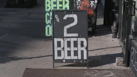$2 Dollar Beer - sign outside of bar - cheap beer 스톡 동영상 335306037
