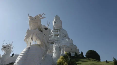2 dragons guarding Guan Yin at Wat Huay Pla Kang, Chiang Rai Stock Footage 331164001