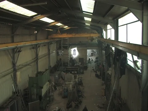 2 factory workers walking in a warehouse. View from above 動画素材 71231403