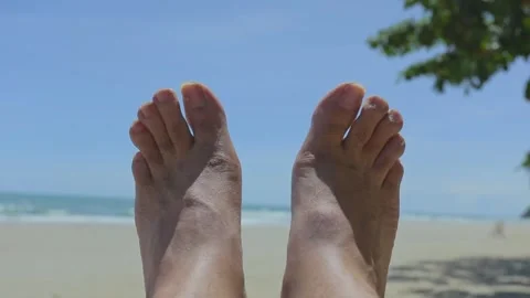 2 foots closeup on the white sand beach blue sky and sea Stock-Footage 280867057