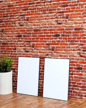 2 frame mockup on red brick wall with an indoor plant and wooden floor, interior Stock Illustration