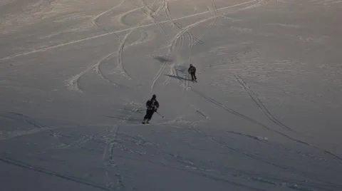 2 freeriders go downhill Stock Footage 46152673