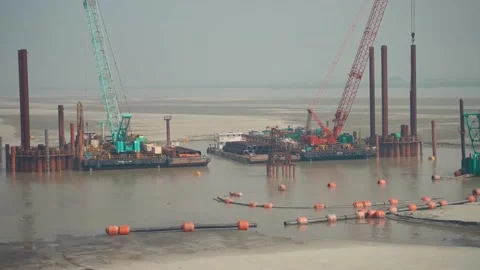 2 freight carrier on a harbor for river restoration project Stock Footage 164512425