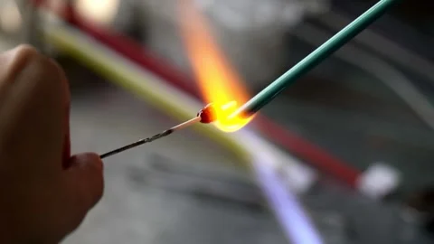 2 glass melts in fire Stock Footage 268433710