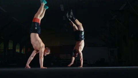2 guys doing handstand walk Video stock 131028812