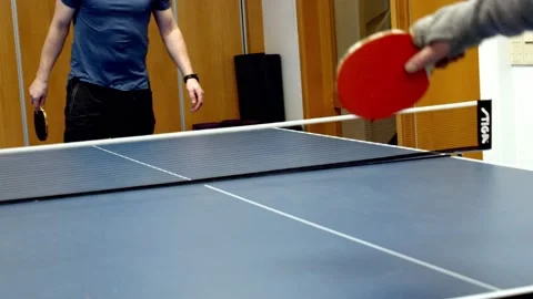 2 guys playing table tennis. workout Stock Footage 233898427