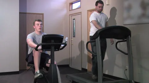 2 guys using the gym Stock Footage 49862923