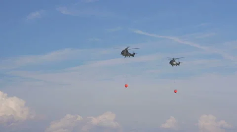 2 Helicopters water drop ready Stock Footage 41868898