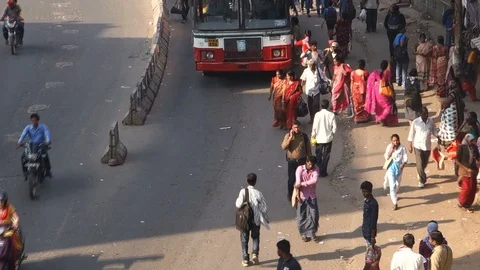 2-High-Angle-View-busy-bus-stop-people-traffic Stock Footage 89420393