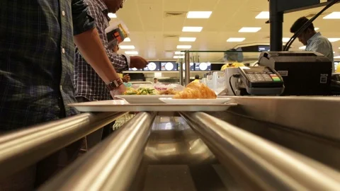 2-Ikea-India-customer-pays-for-food-at-checkout Stock Footage 94399211