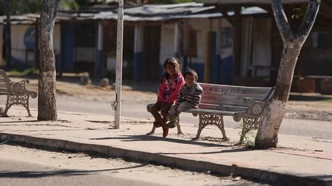 2 kids on bench Stock Footage 95496393