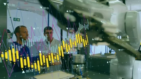 2 lab engineers pointing at tablet, input starting robot moving into frame, Stock Footage 333689869