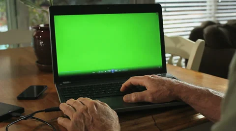 2 LAPTOP GREENSCREEN DOLLY IN Stock Footage 33847236