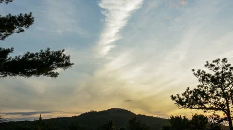 2 layers of clouds over mountain peak Stock Footage 40450943