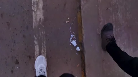 2 man walking on a dirty road Stock Footage 275394789