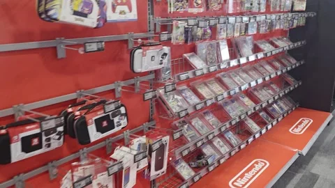 2 May 2024 Miami, Florida - Walking Nintendo Switch Game Console Stock Footage 327152450