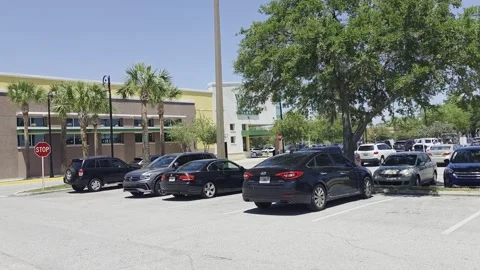 2 May 2024 Orlando, Florida - Walking Businesses Sidewalk Street Stock Footage 335392949