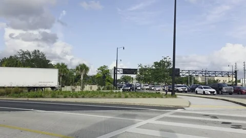 2 May 2024 Orlando, Florida - Walking Businesses Sidewalk Area Street Video stock 337321352