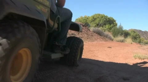 2 Men Driving Gator Stock Footage 8692520