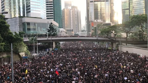 2 million peaceful protesters marching against extradition bill. 'Add Oil HK' Stock Footage 116443273