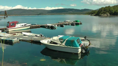 2 moored speedboats Stock Footage 38033450