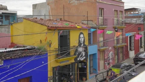 2 October, 2024-Mexico, Oaxaca: Colorful streets people physical workers cars Stock Footage 287064470