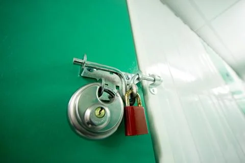 2 padlocks on a self storage unit Stock Photos