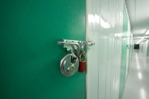 2 Padlocks on a self storage unit door Stock Photos