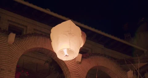 2 paper lanterns fly in the night Stock Footage 260275396