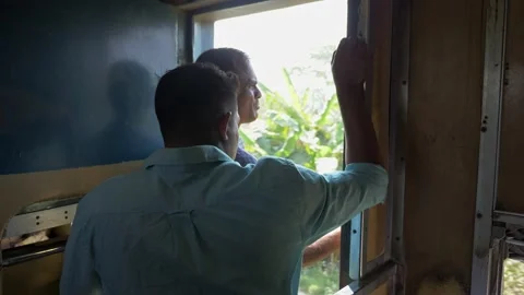 2 Passengers beside an open train door Video stock 153123699