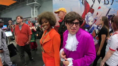 2 people dressed up as 70's characters Video stock 148518101