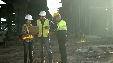 2 people engineer and  1 people  foreman checking working on tollway road  .. Stock Footage 246350069