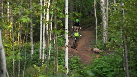 2 People Mountain Biking Stock Footage 243217288