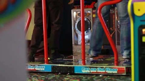 2 People Playing Dance Arcade Game, Long Range Stock Footage 49147340