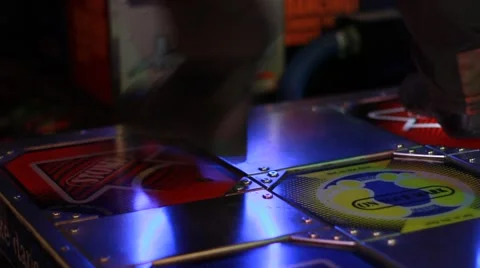 2 People Playing Dance Arcade Game w/ Right Camera Pan Stock Footage 49147937