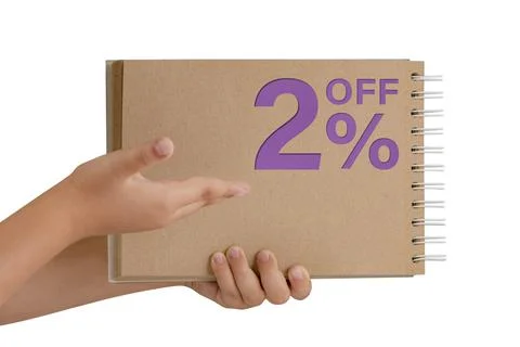 2 percent discount on isolate. Notepad from recycled paper in the hands of a Stock Photos