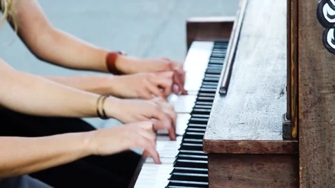 2 pianists playing energetically on public piano, music duo Stock Footage 87346695